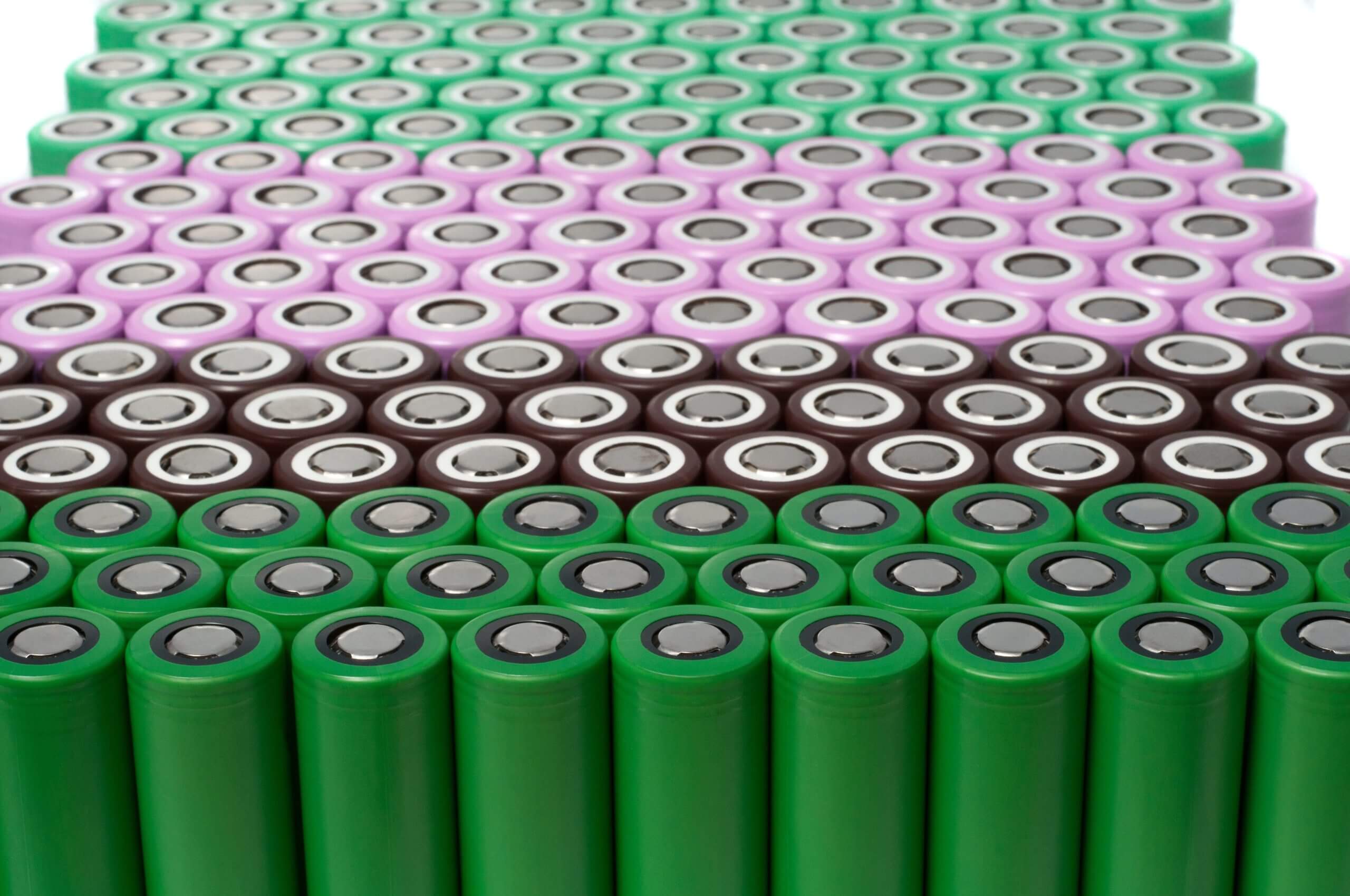 Rows of batteries in colored wrapping, highlighting EMS's focus on consistent, high-quality battery production