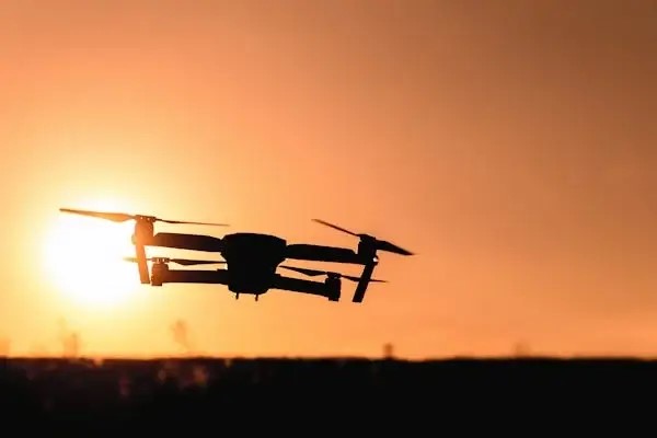 Close-up of a drone in flight, showcasing advancements in battery-powered technology for electronics | EMS